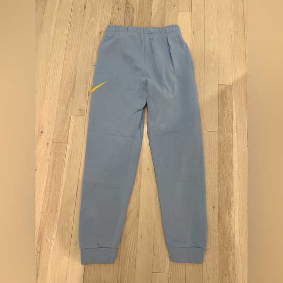 Nike Kids Light Blue Joggers with Yellow Logo Size L - Picture 4 of 4